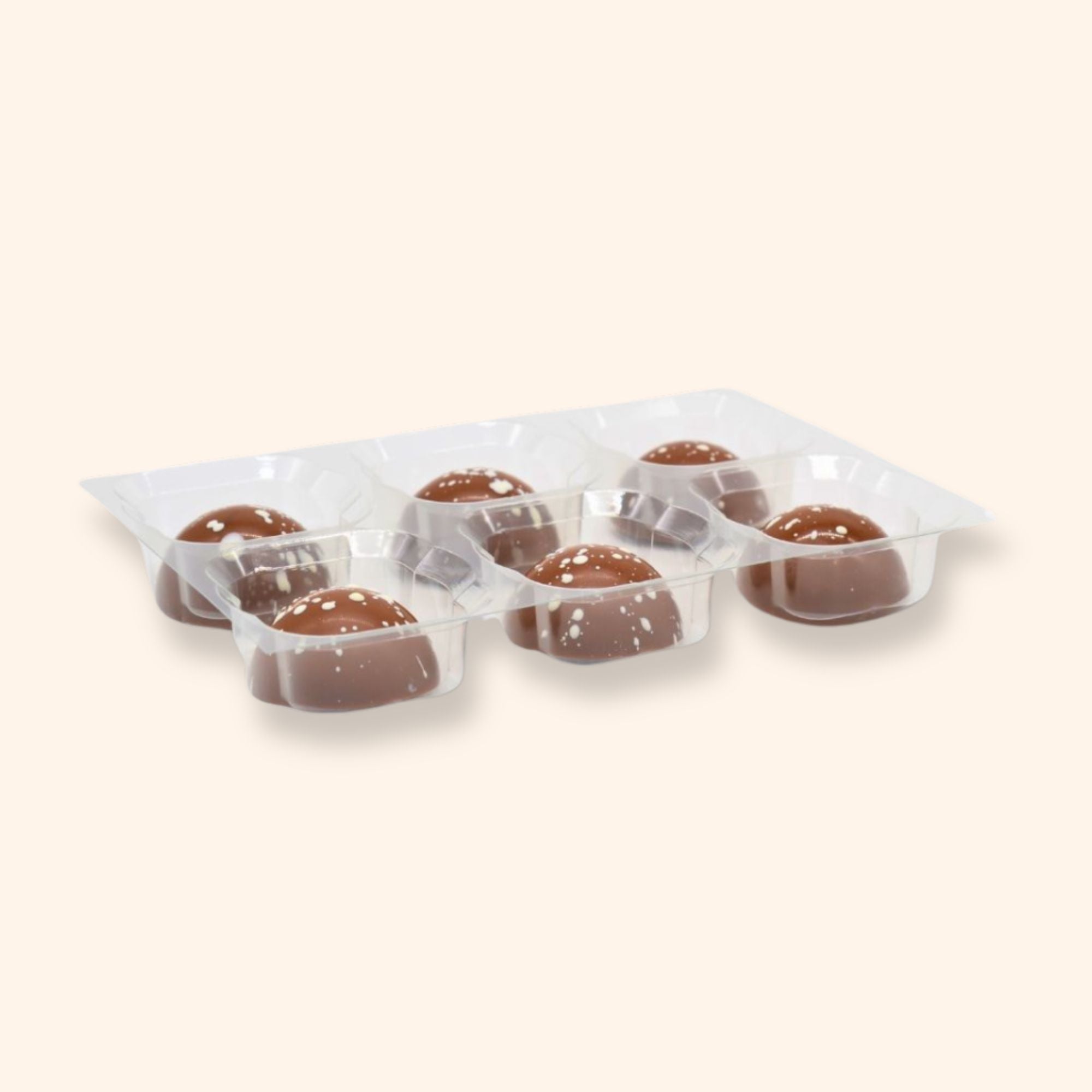 A tray of 6 caramel latte chocolates