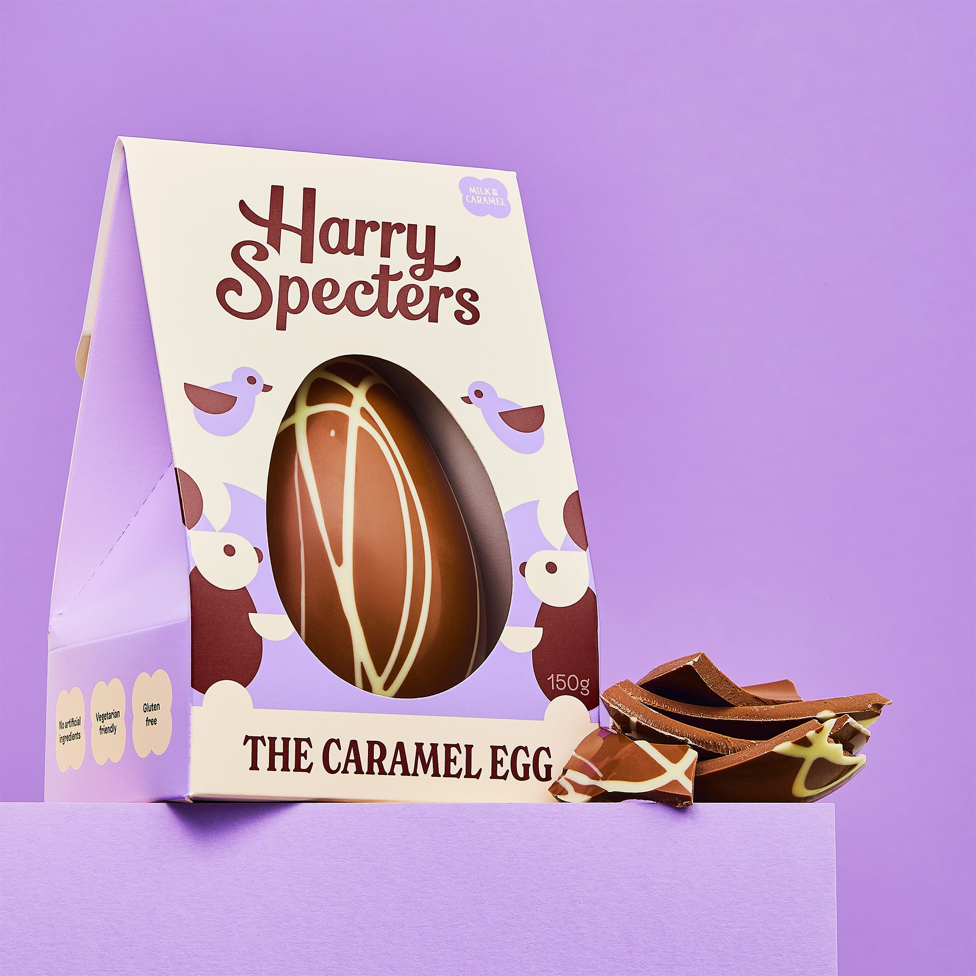 The Caramel Egg is a caramel chocolate luxury Easter egg shown on a purple background