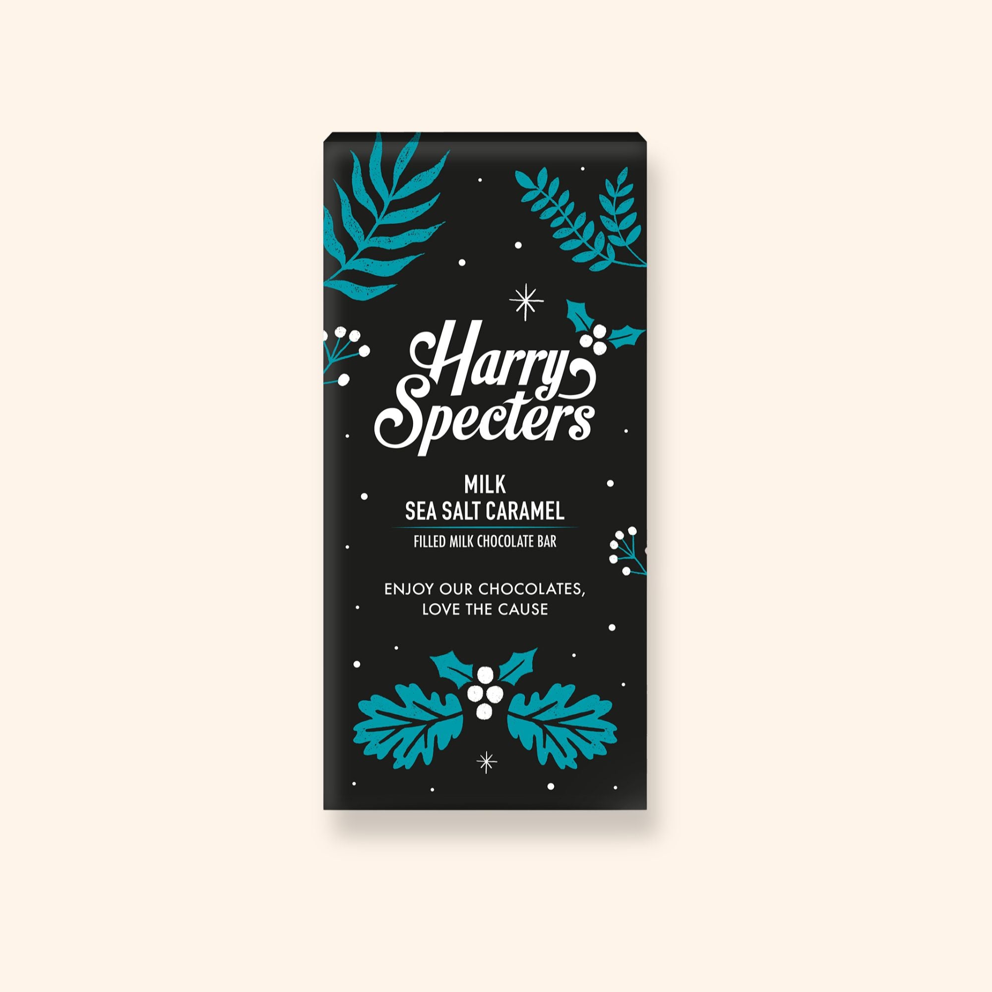 A Harry Specters milk chocolate bar filled with sea salt caramel in festive Christmas packaging