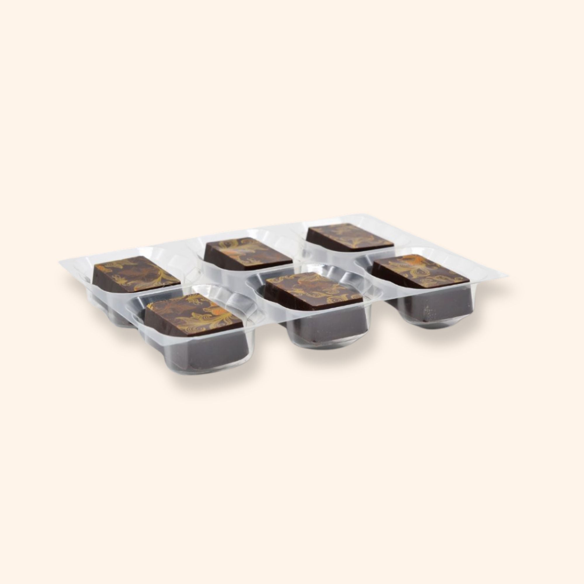 A tray of 6 orange caramel dark chocolates