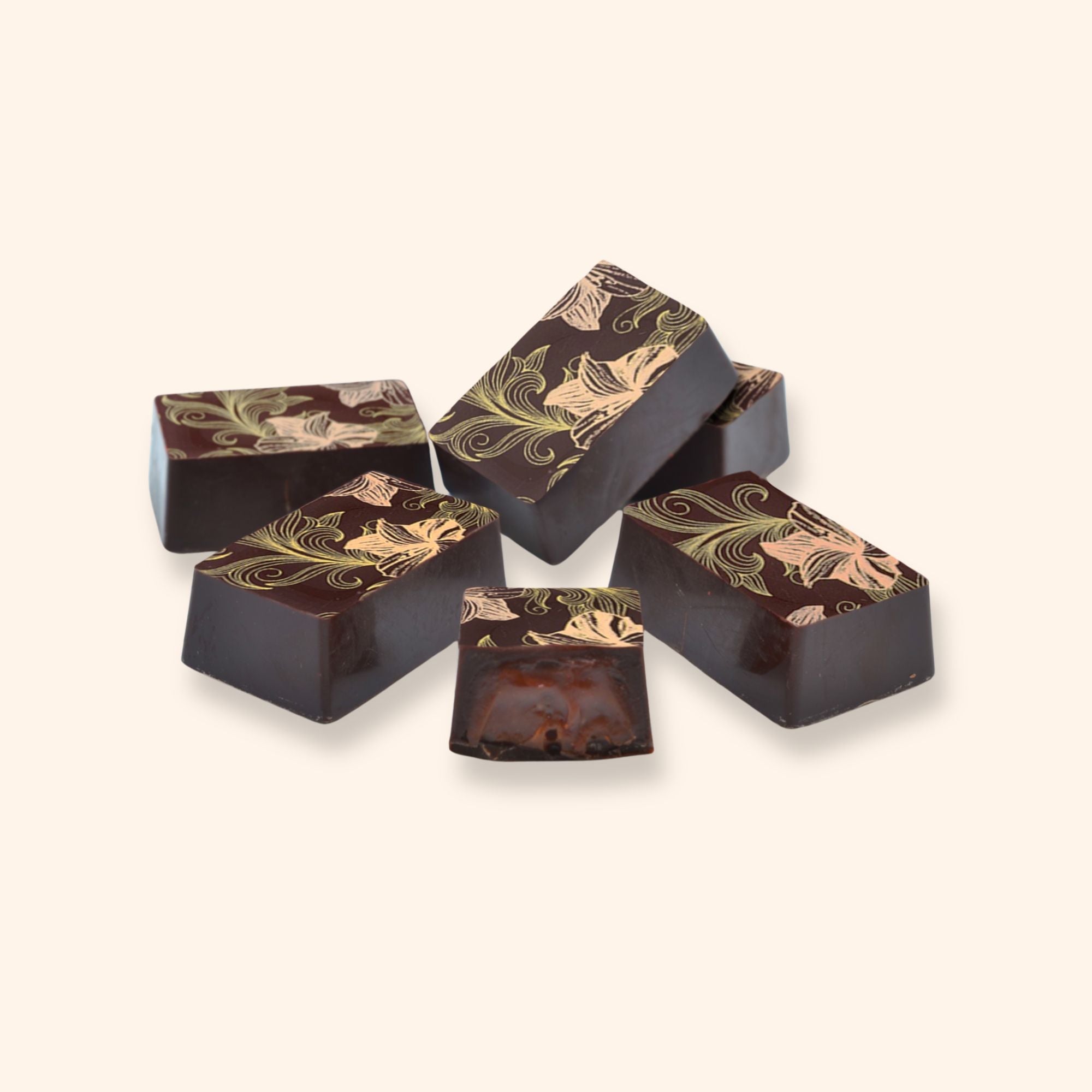 Six luxury dark orange caramel chocolates