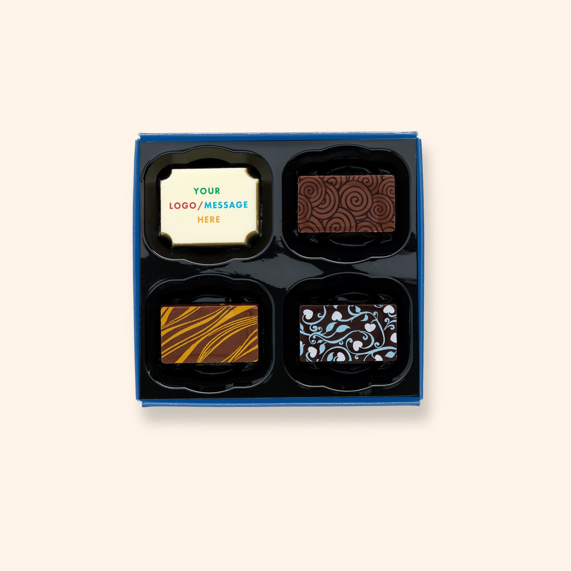 A box of 4 chocolates colourfully decorated and featuring a personalised chocolate with the message your logo/message here