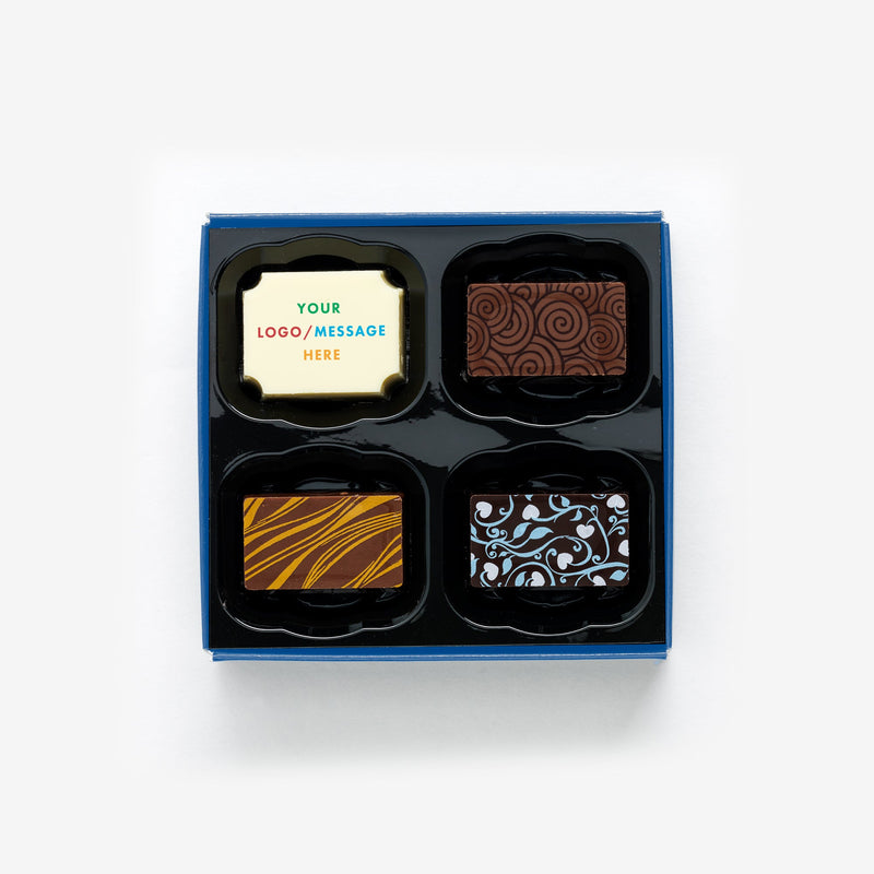 A box of 4 chocolates colourfully decorated and featuring a personalised chocolate with the message your logo/message here