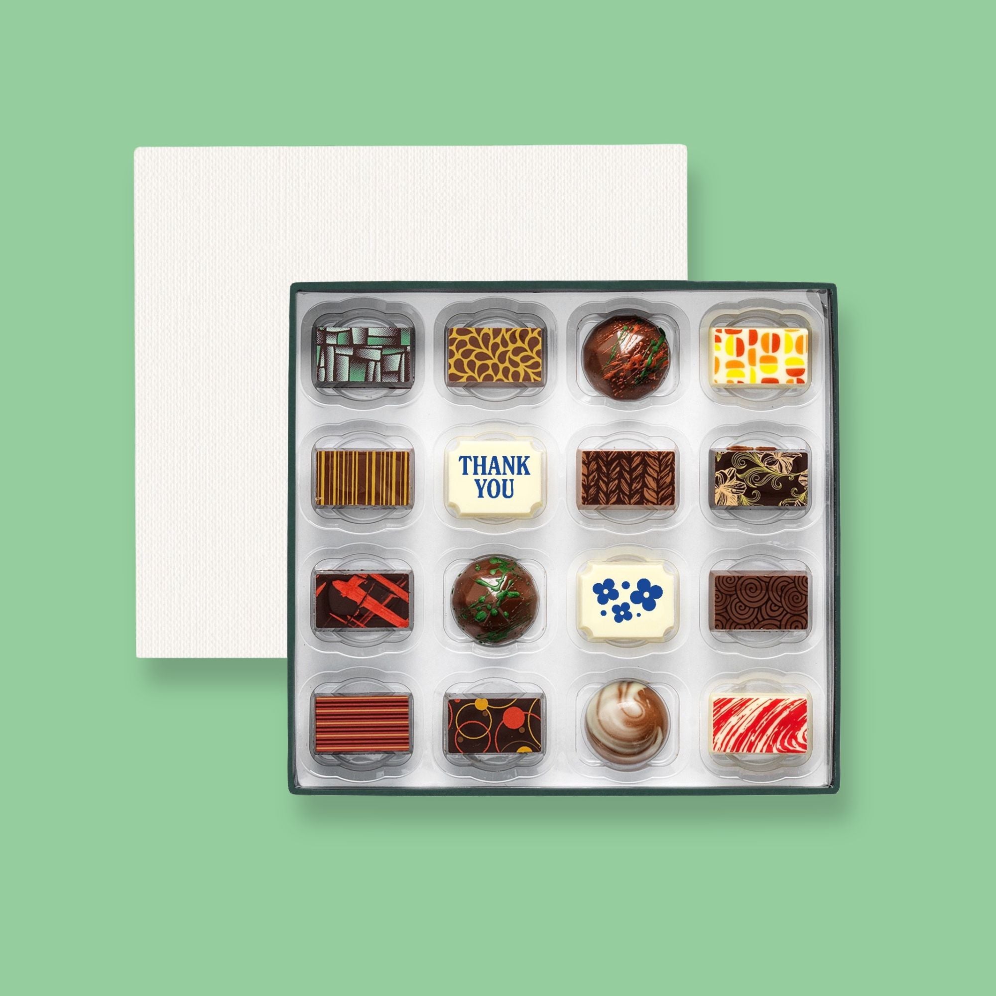 A box of 16 artisan chocolates colourfully decorated and featuring two Thank You gift themed designs
