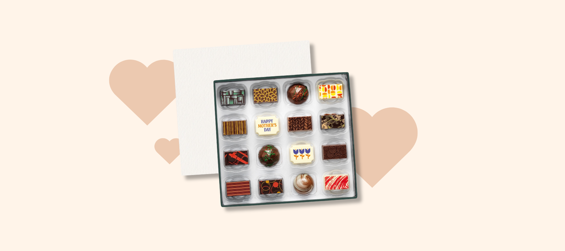 A box of Mother's Day chocolates on a pale background