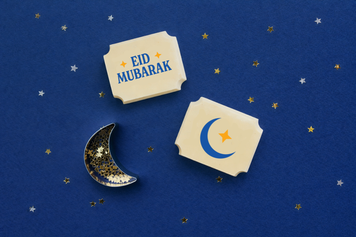 Eid Mubarak chocolates with crescent moon and star on a blue background
