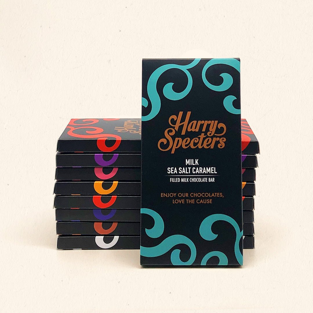 A pile of chocolate bars in colourful packaging