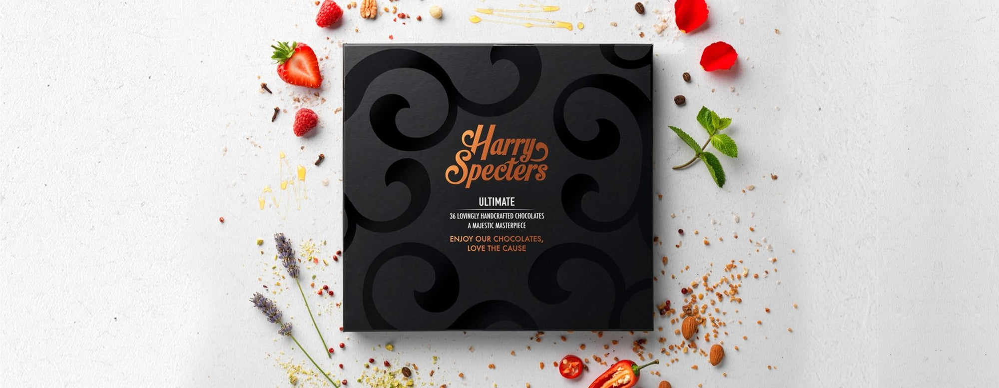 A box of chocolates surrounded by ingredients
