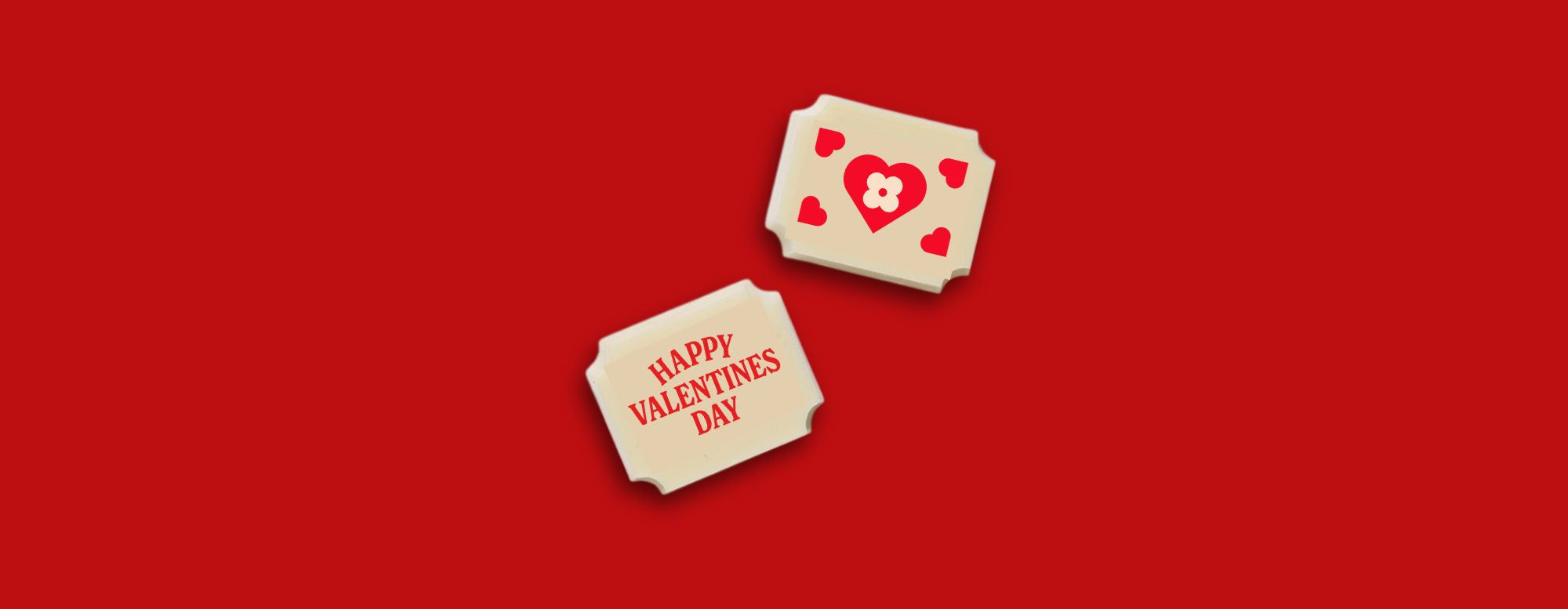 Two white chocolates with Valentine's Day messages