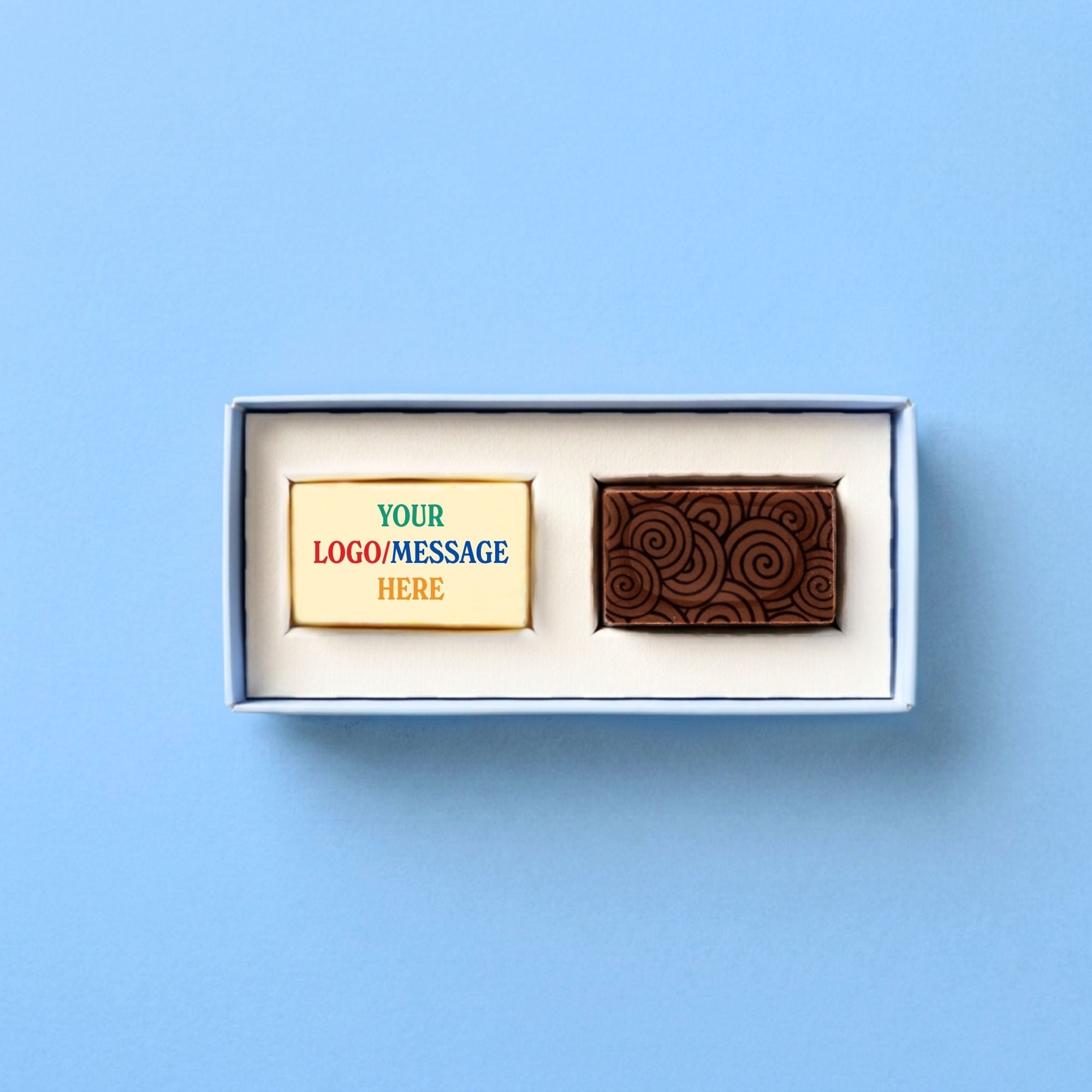 Two artisan chocolates in a box with customizable text on a blue background
