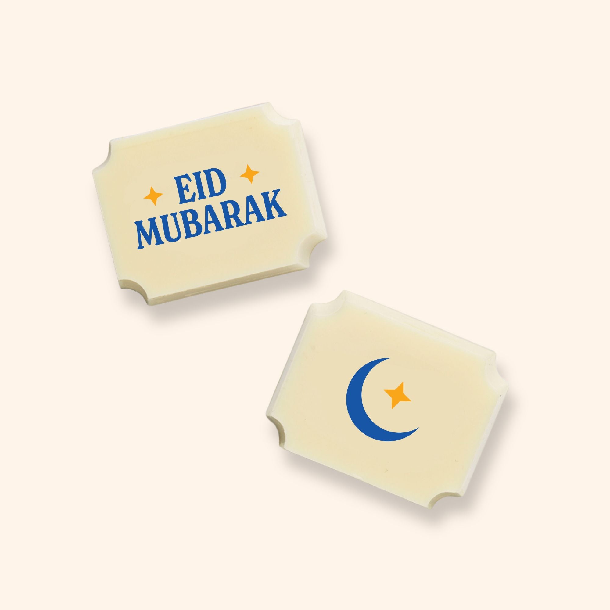 Two luxury white chocolates with an Eid Mubarak message