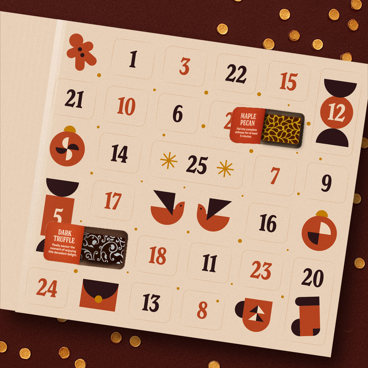 Luxury chocolate advent calendar with decorative elements on a brown background