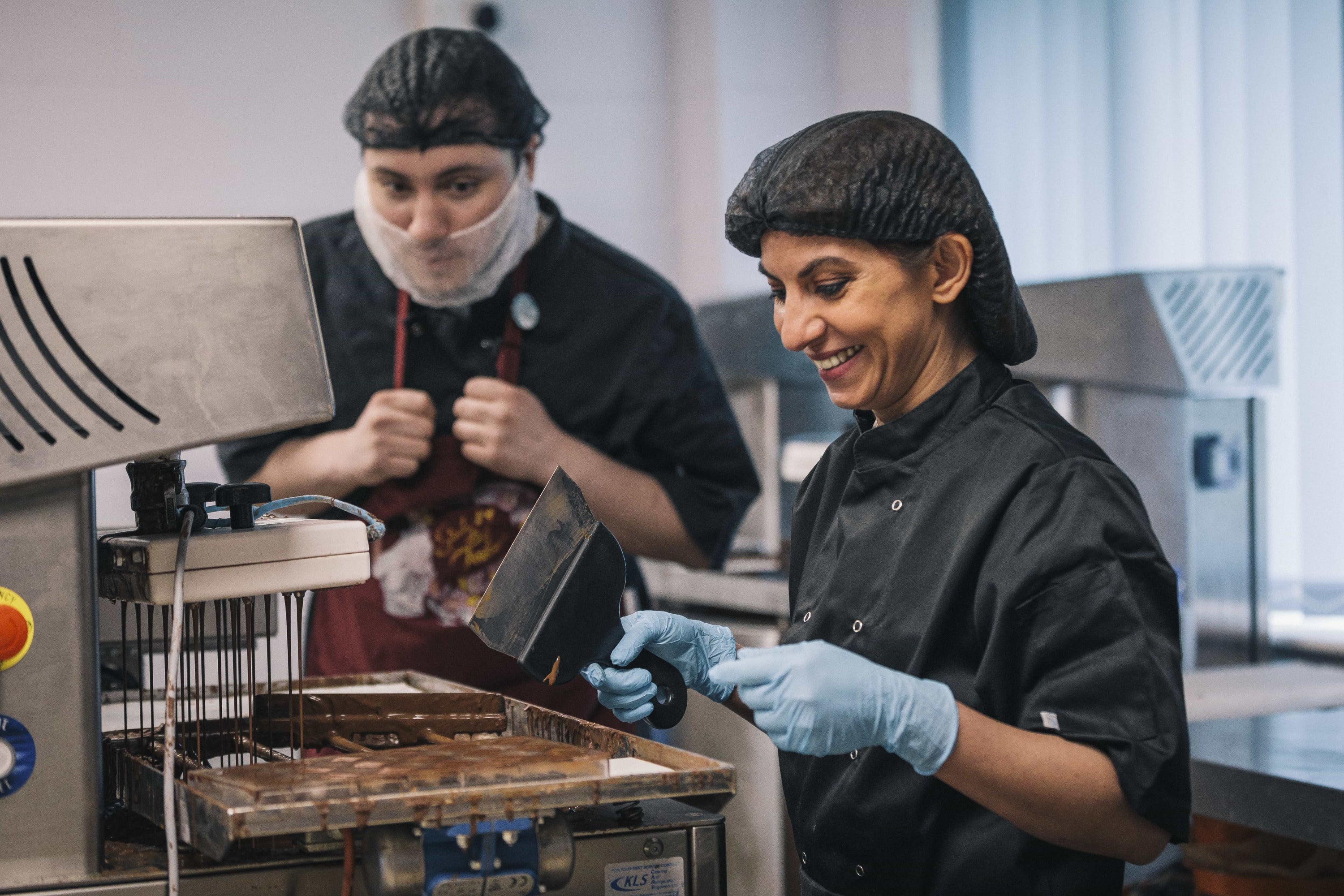 Two people making chocolate at Harry Specters