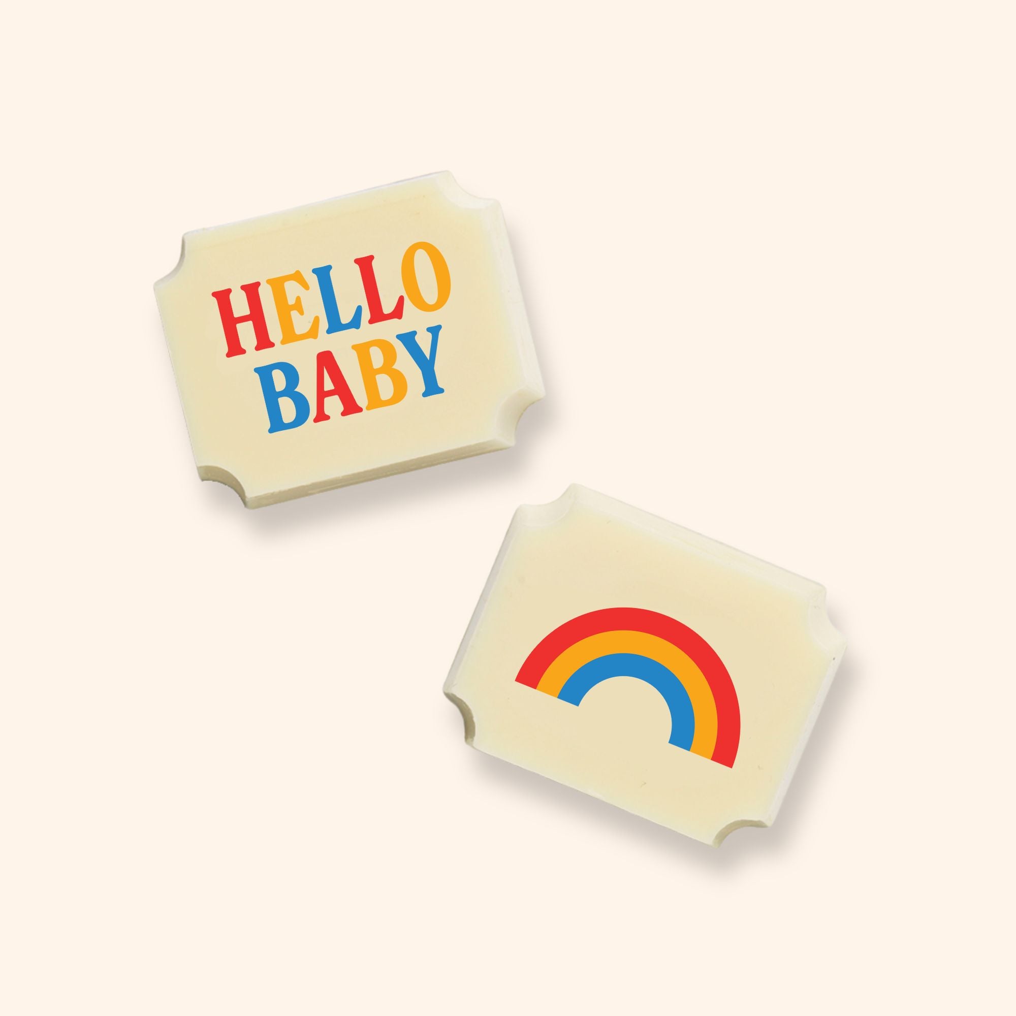 Two luxury white chocolates with a Hello Baby message