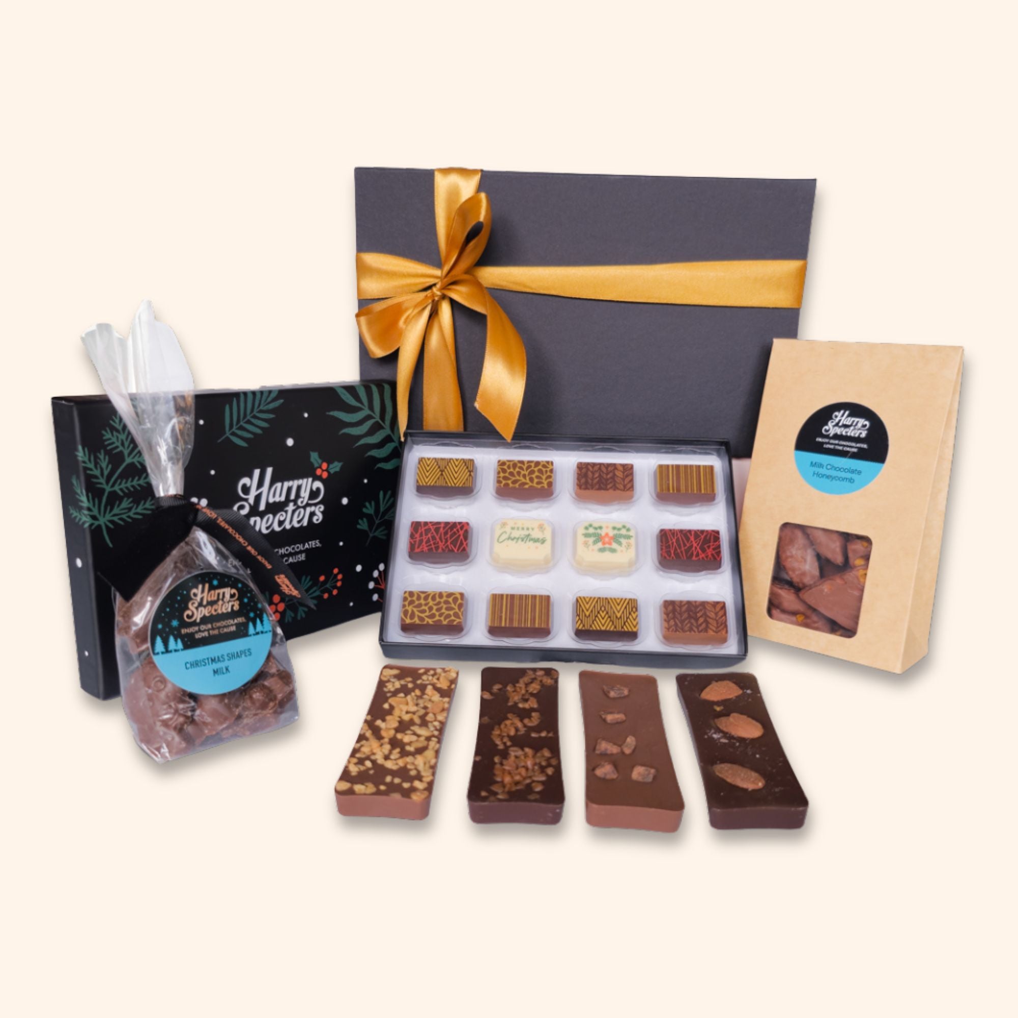 A small chocolate Christmas hamper including chocolate honeycomb, shapes, miniature bars, and a box of premium chocolates