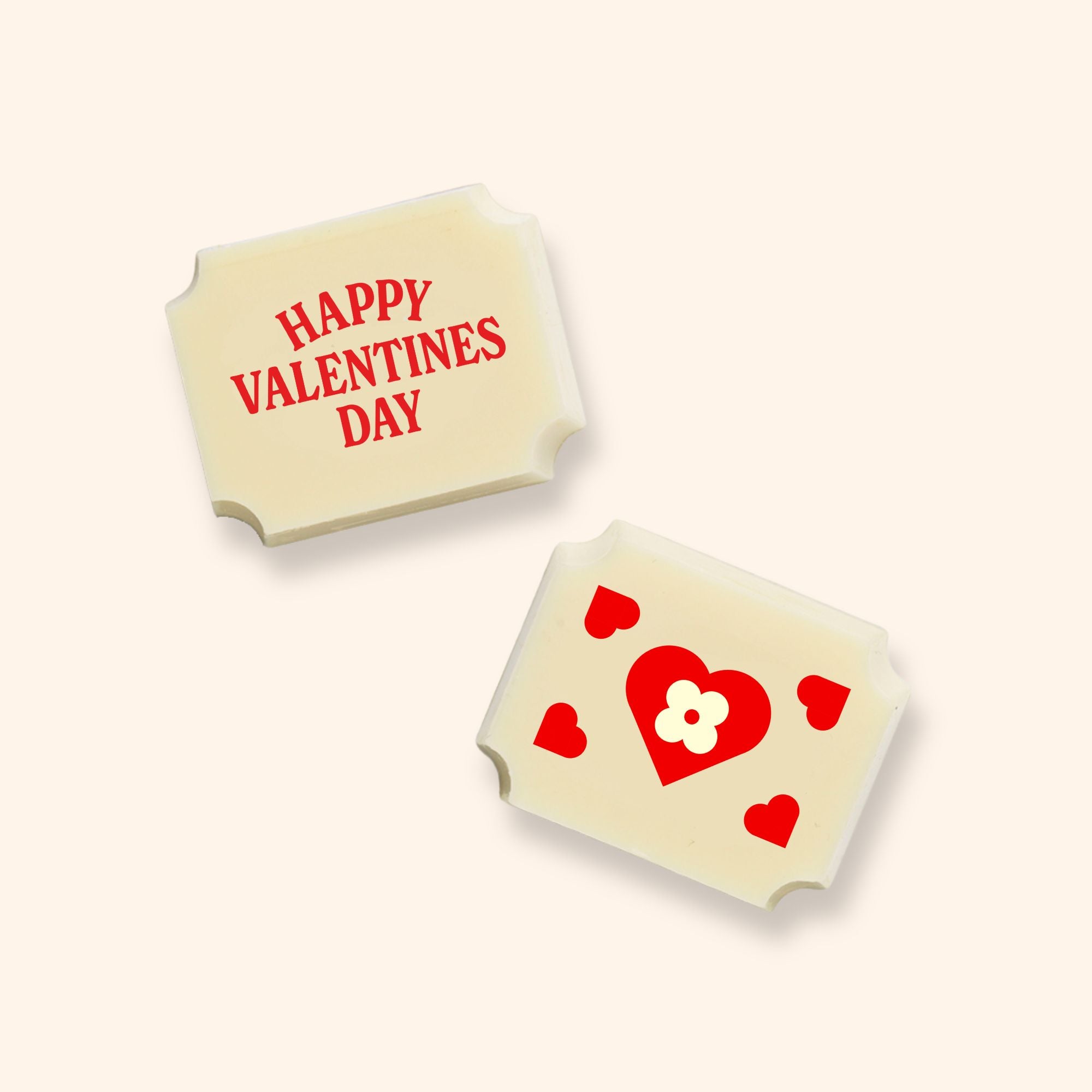 Two luxury white chocolates with a Happy Valentine's Day message