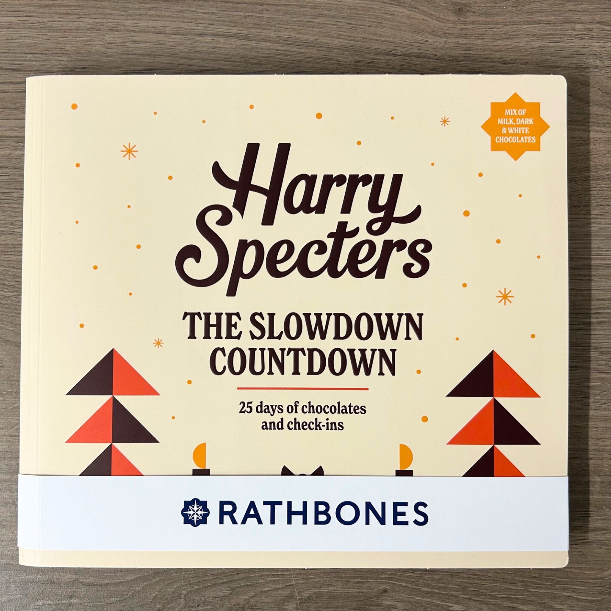 Packaging of a luxury chocolate advent calendar by Harry Specters with a personalised Rathbones wrap