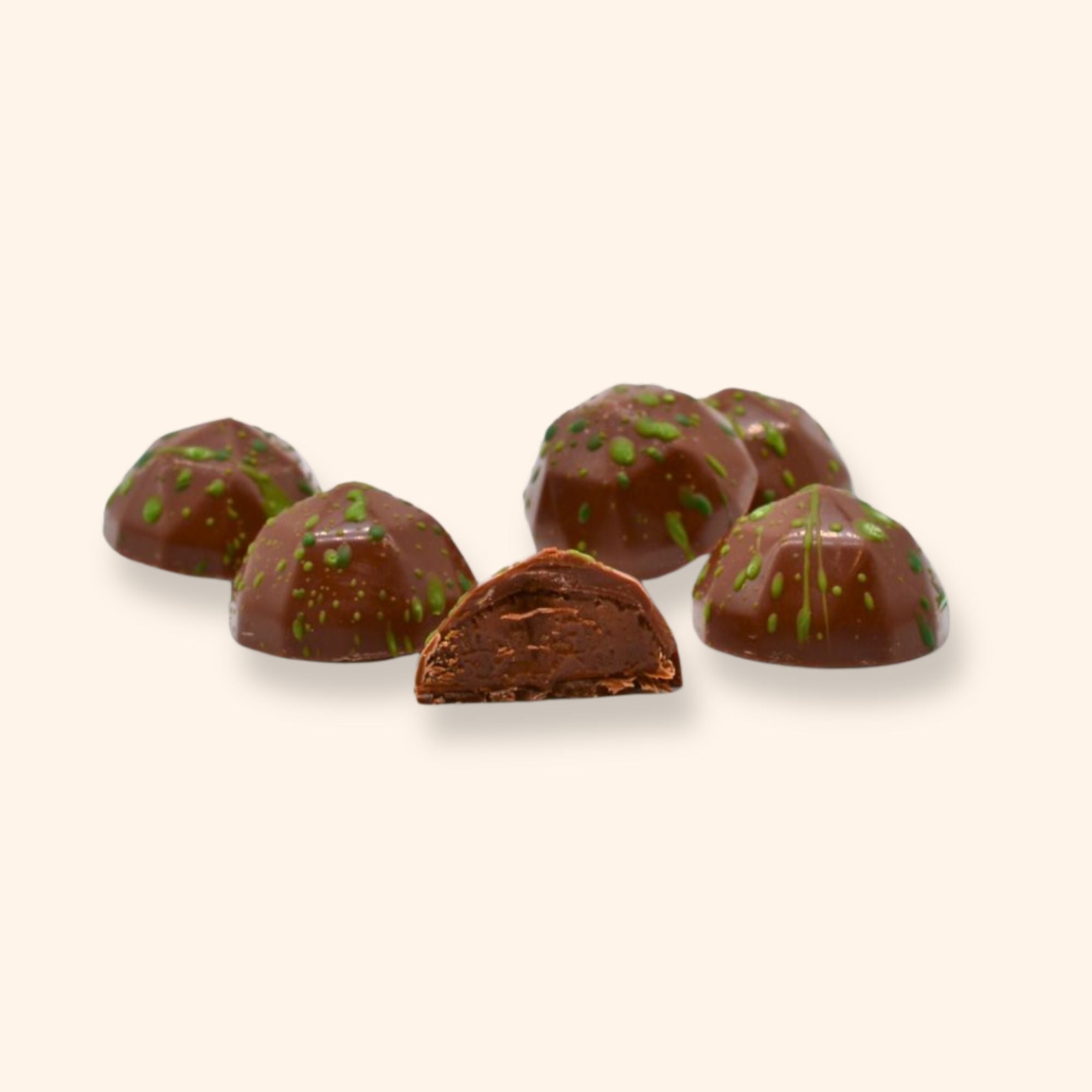 6 apple cinnamon milk chocolates decorated by hand