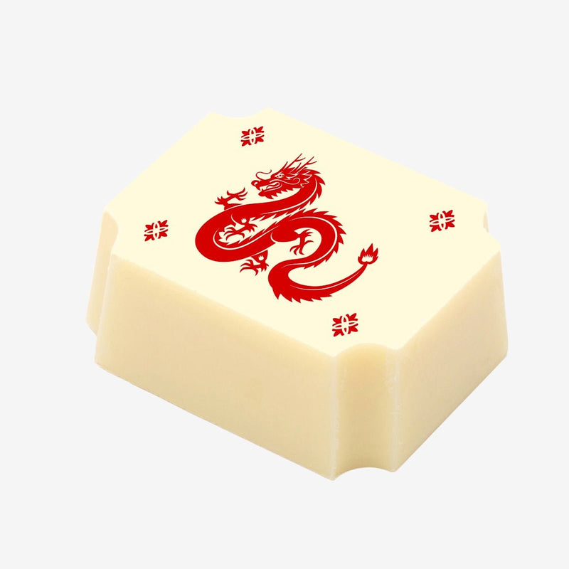 A white chocolate for Chinese New Year with an image of a dragon