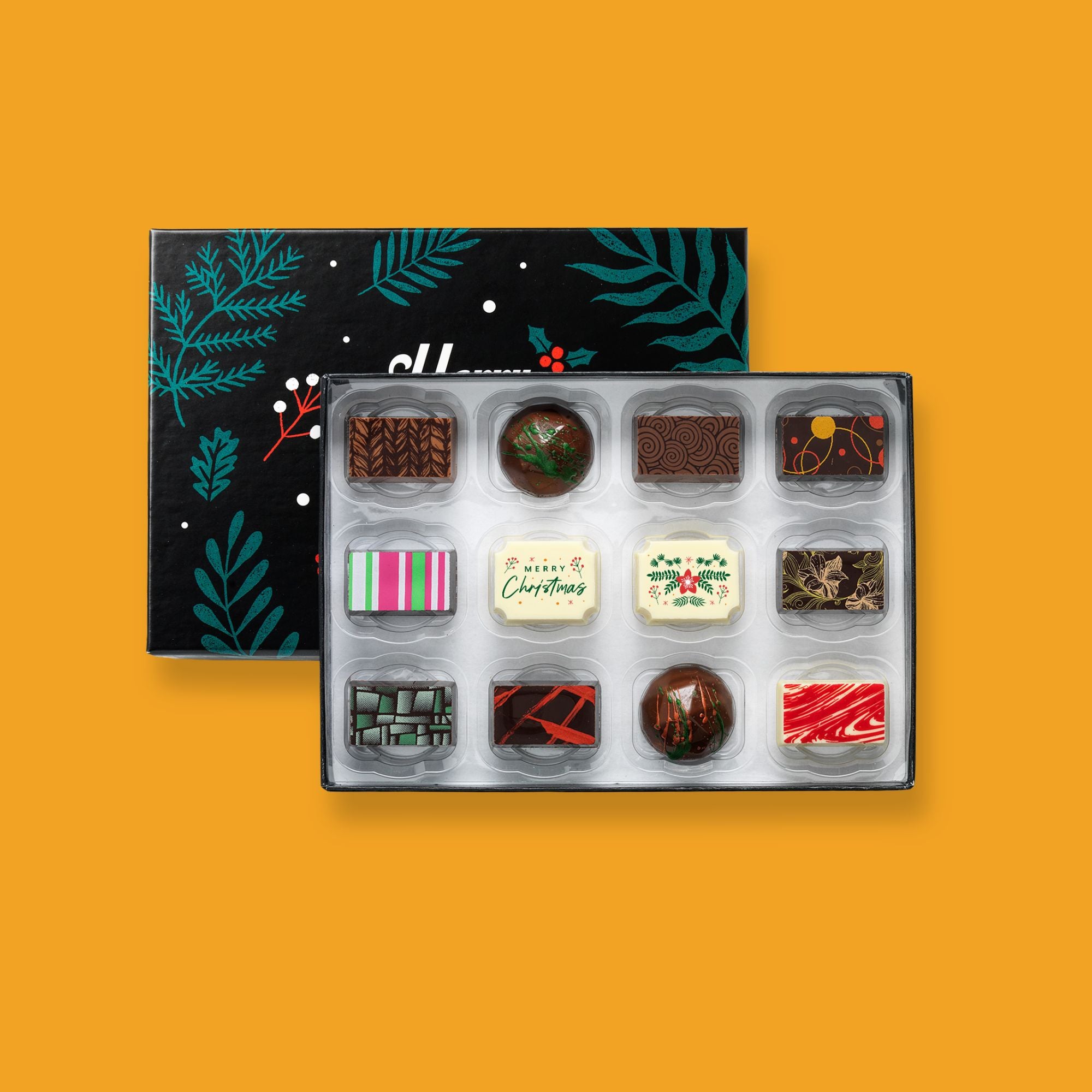 A festive box of 12 artisan chocolates colourfully decorated and featuring two Christmas themed designs