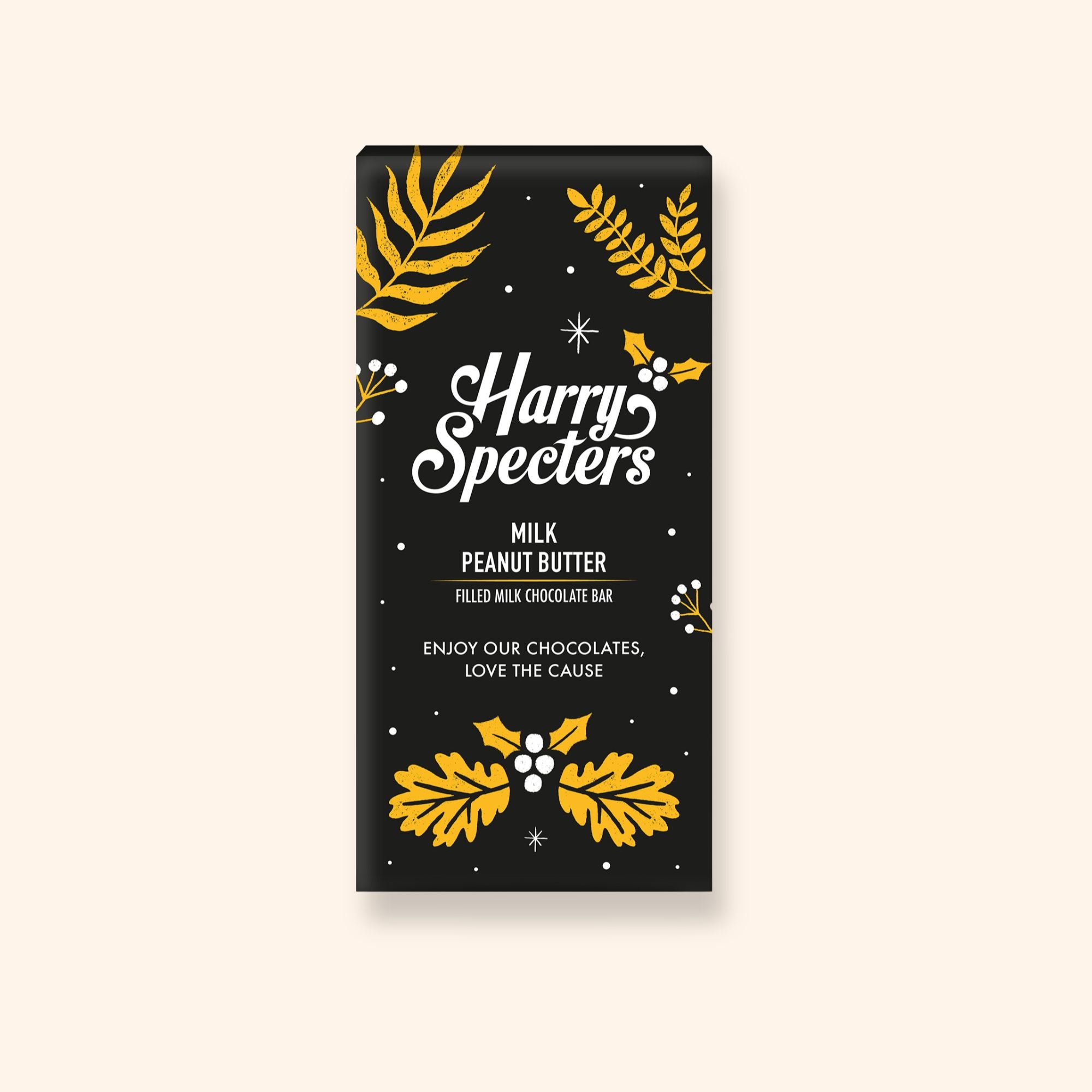 A Harry Specters milk chocolate bar filled with peanut butter in festive Christmas packaging
