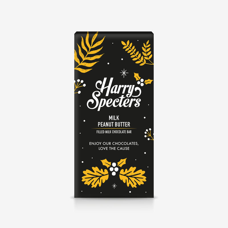 A Harry Specters milk chocolate bar filled with peanut butter in festive Christmas packaging