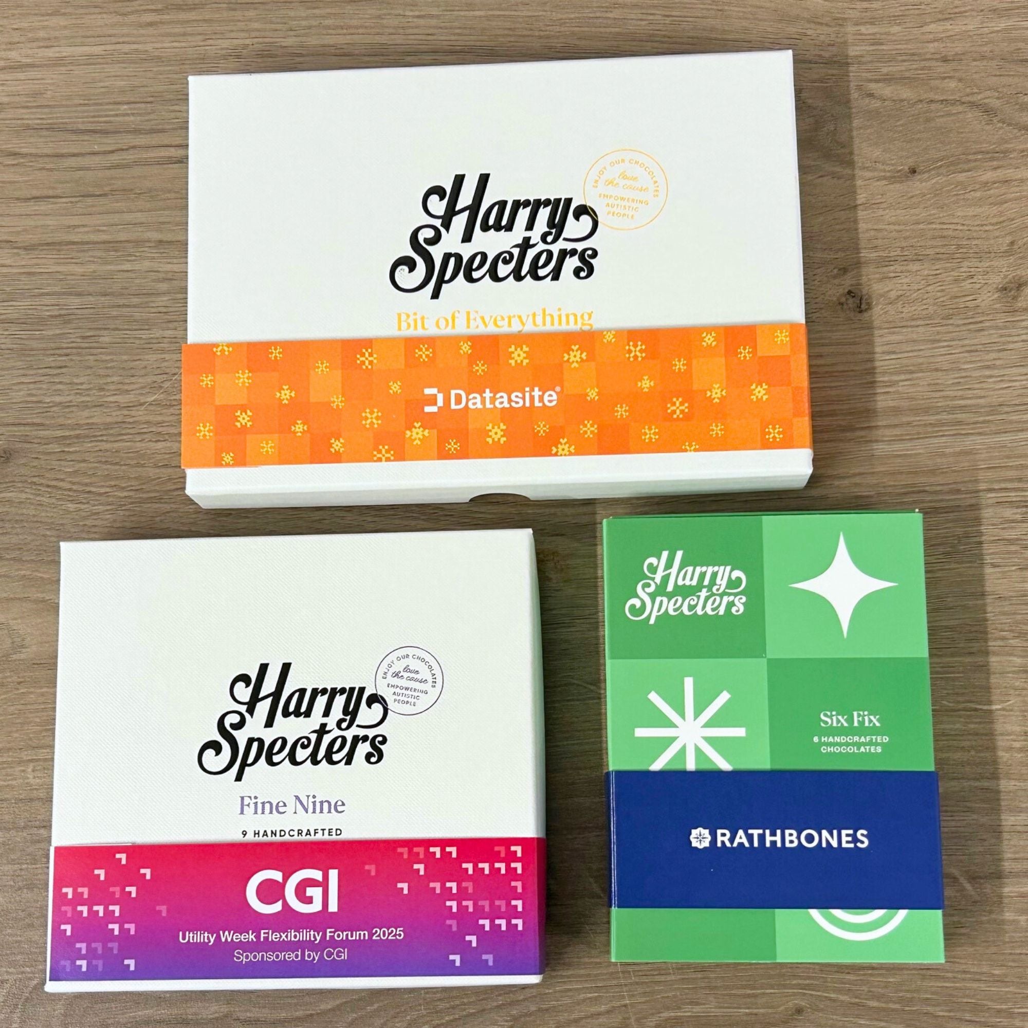 There luxury chocolate boxes with personalised wraps for corporate gifting