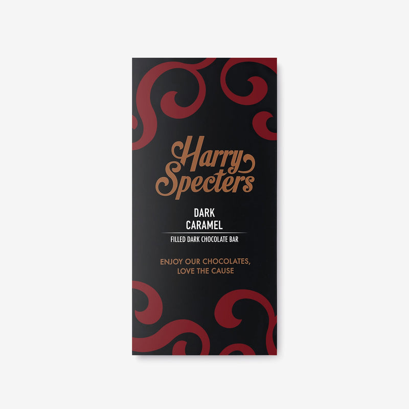 A vegan dark chocolate bar by Harry Specters filled with caramel shown in colourful packaging