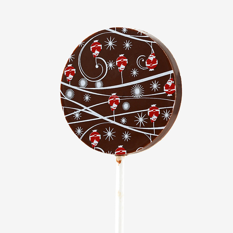 A dark chocolate lollipop featuring a Christmas bauble Santa Claus design