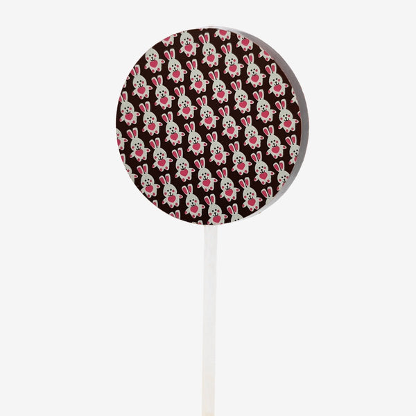 A dark chocolate lollipop featuring an Easter bunny design