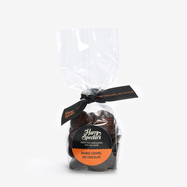 A bag of dark hot chocolate buttons filled with orange caramel