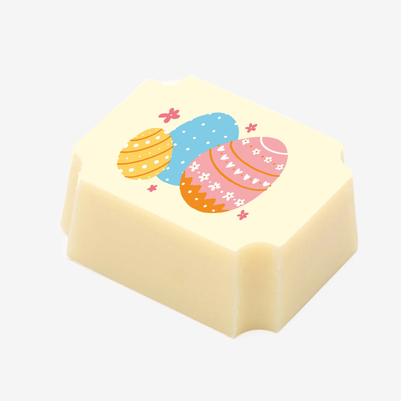 A white chocolate with an Easter egg design