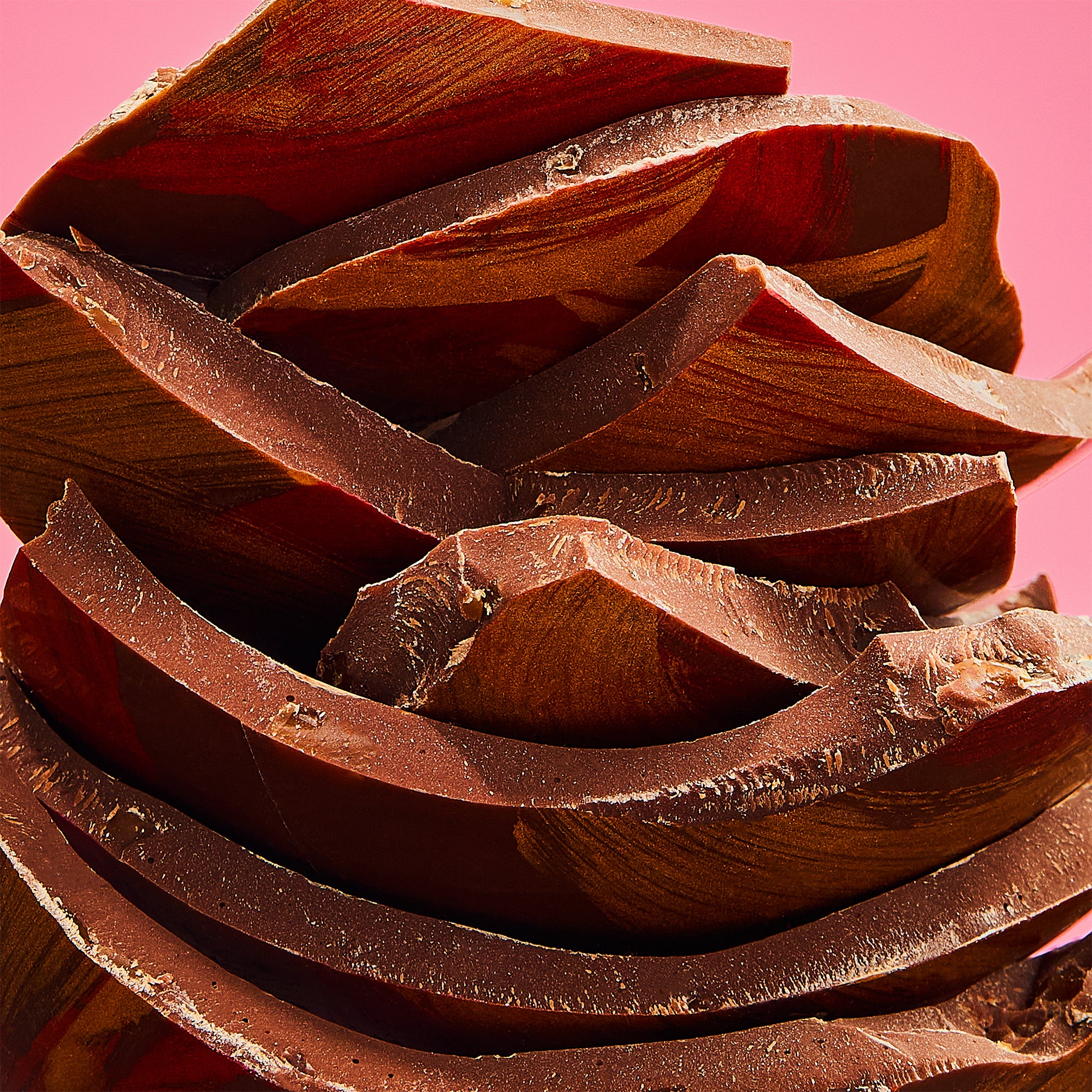 A stack of milk chocolate luxury Easter egg pieces