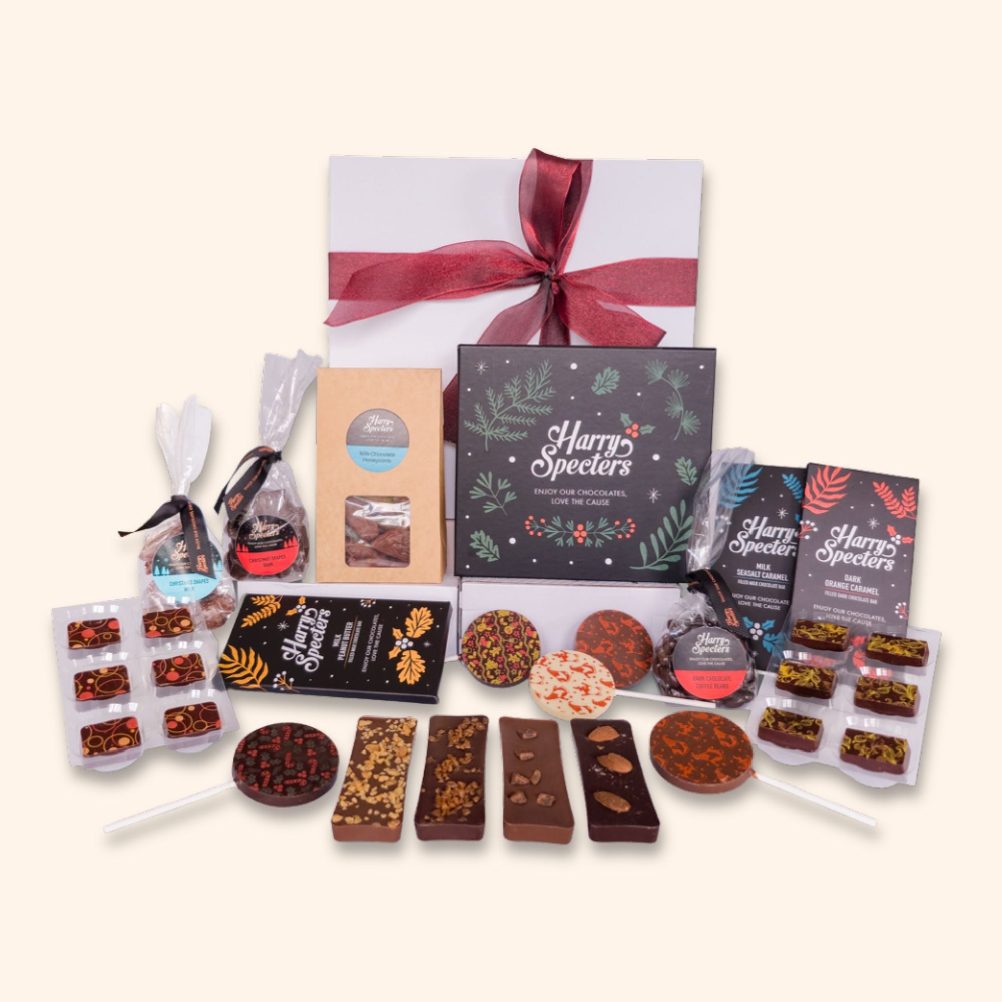 A large chocolate Christmas hamper featuring mini treats, bars, and a box of luxury chocolates