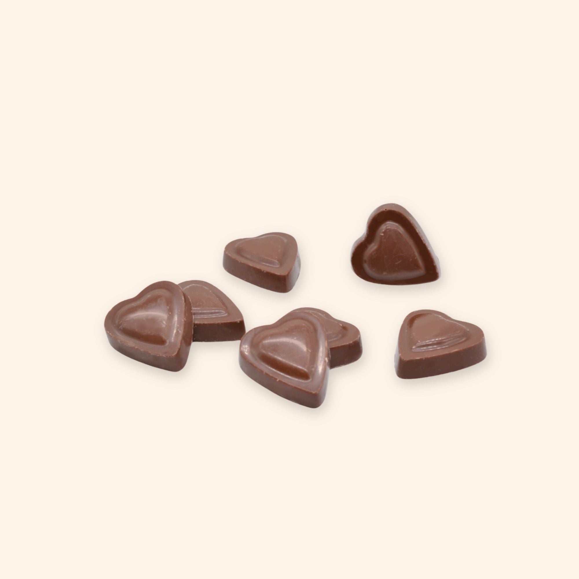 A pile of milk chocolate heart shapes for Valentine's day
