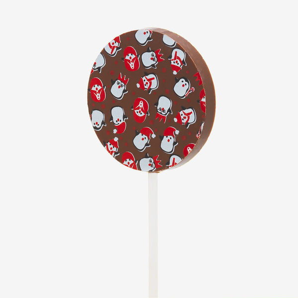 A milk chocolate lollipop with a Christmas design featuring baubles