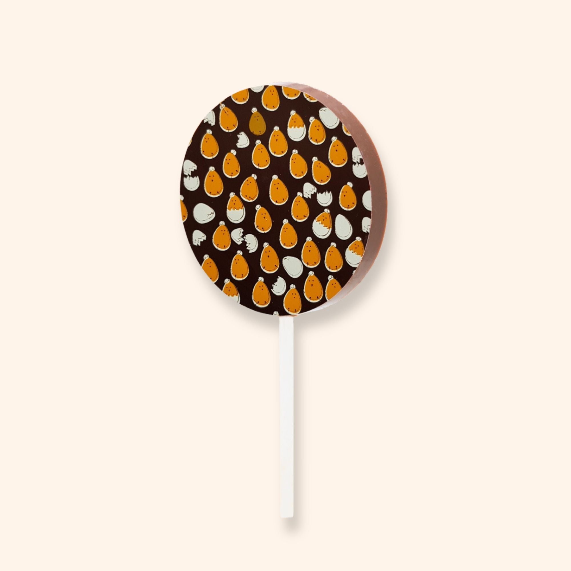 A milk chocolate lollipop featuring and Easter design with chicks