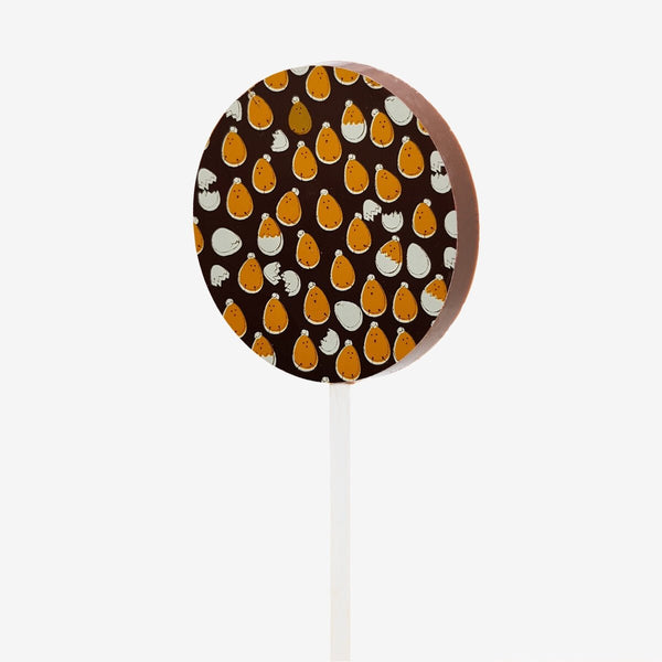 A milk chocolate lollipop featuring and Easter design with chicks