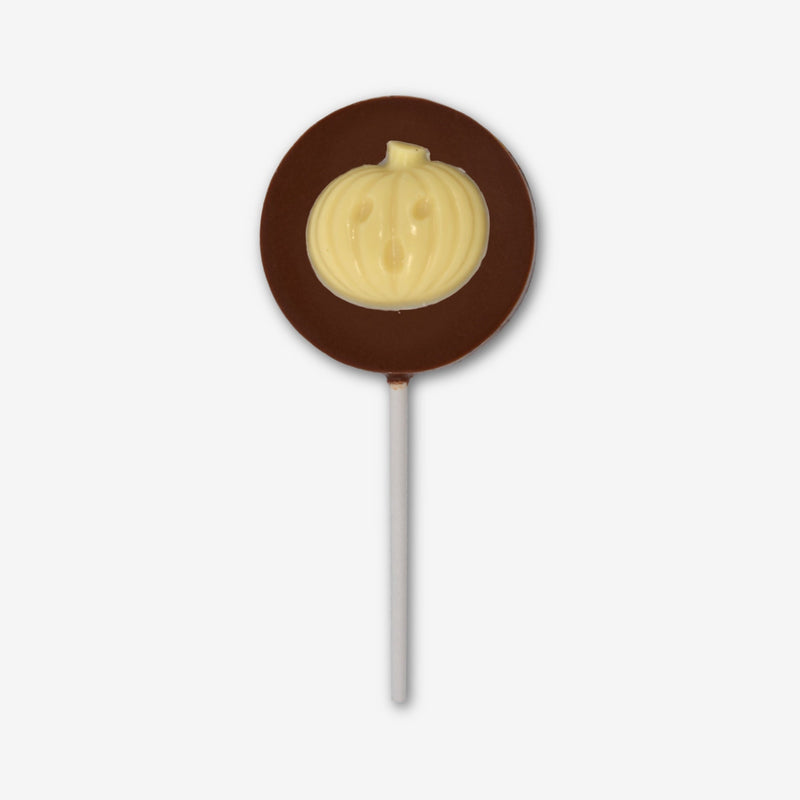 A milk chocolate lollipop with a white chocolate Halloween design