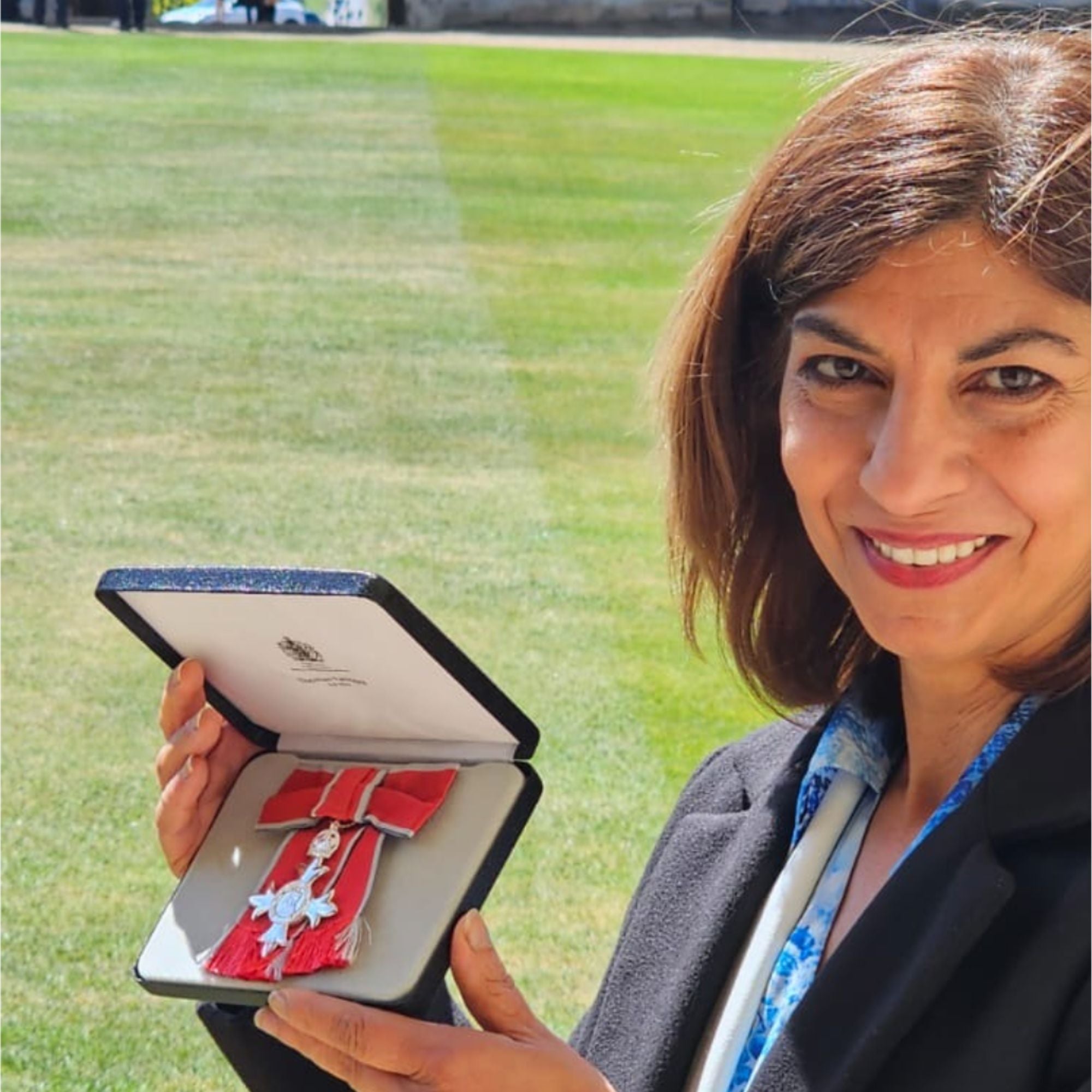 Harry Specters founder Mona Shah with her MBE medal