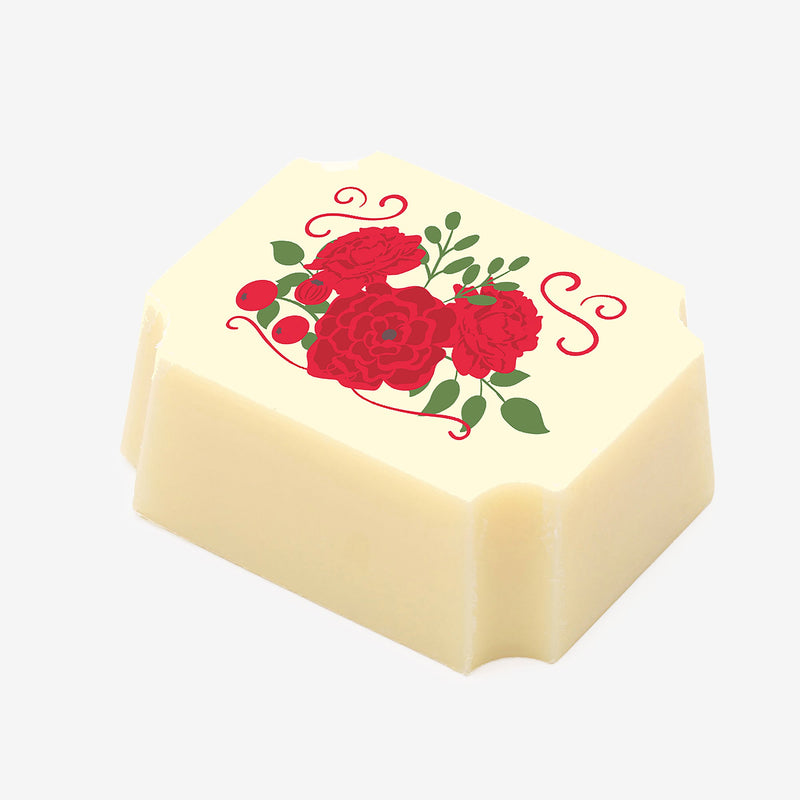 A white chocolate featuring a red floral design