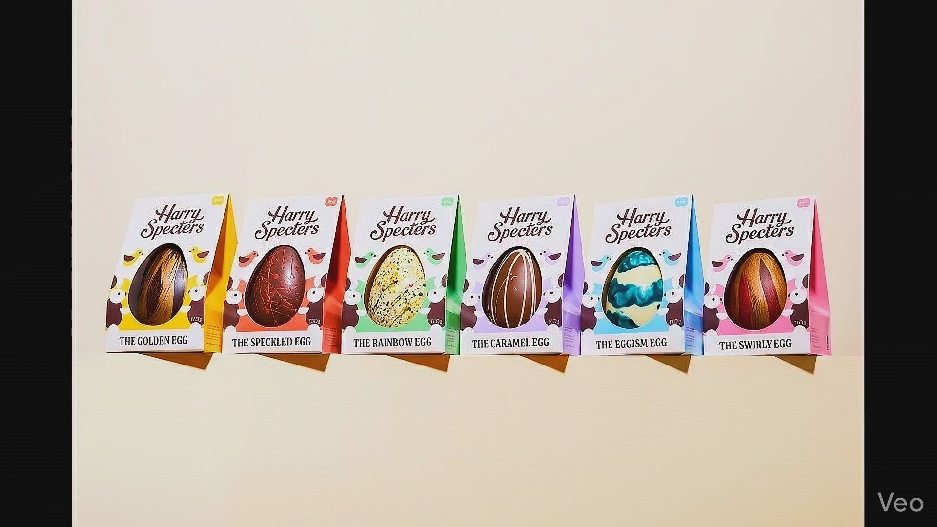 A cinematic video showing a collection of luxury chocolate Easter eggs by Harry Specters