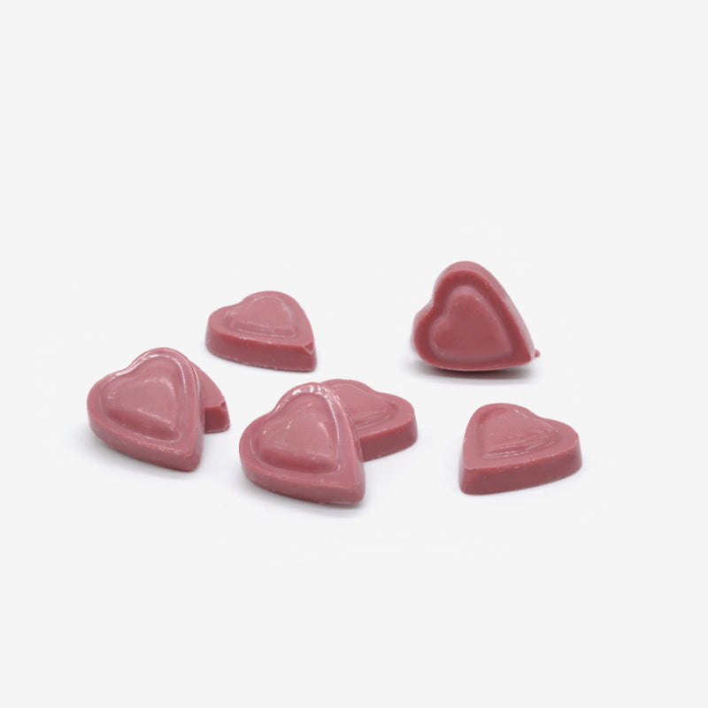 A pile of ruby chocolate heart shapes for Valentine's Day