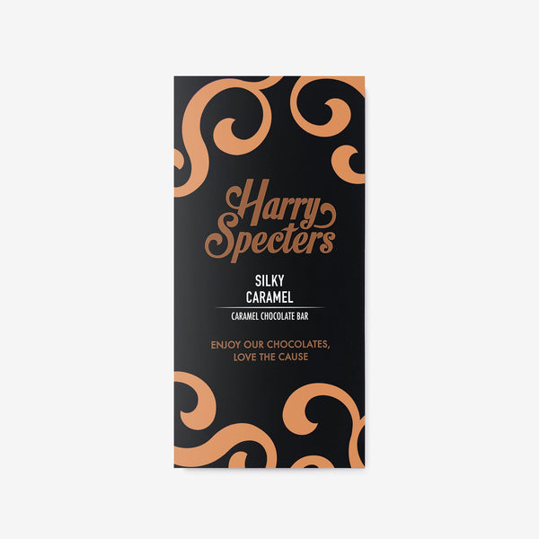 A milk caramel chocolate bar in colourful packaging featuring the name Harry Specters