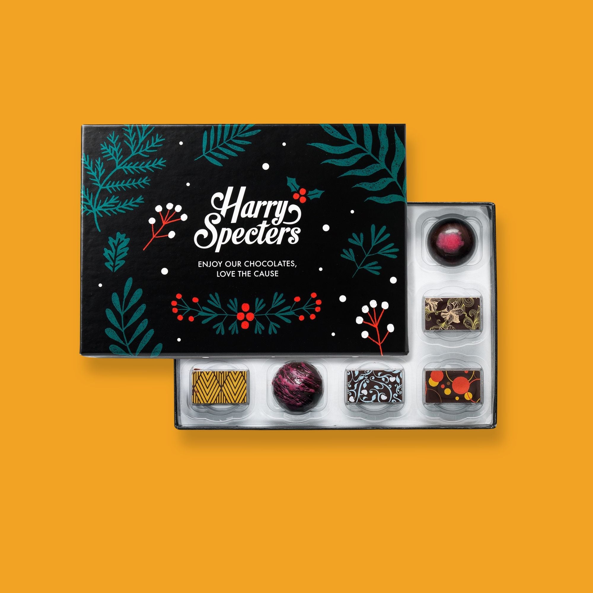 A half closed Christmas chocolate box made with plant-based ingredients