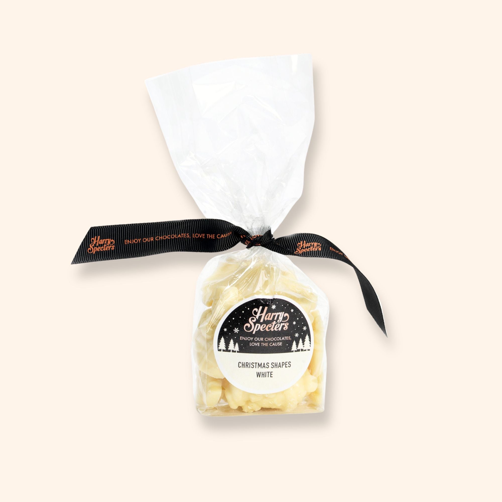 A bag of white Chocolate Christmas Shapes 